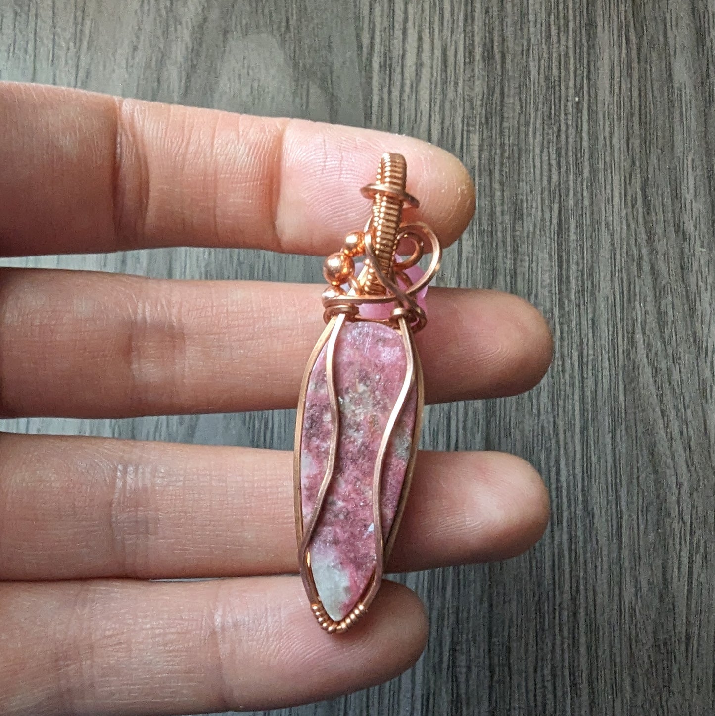 #2 Thulite Flower Pendant - copper wire wrapped