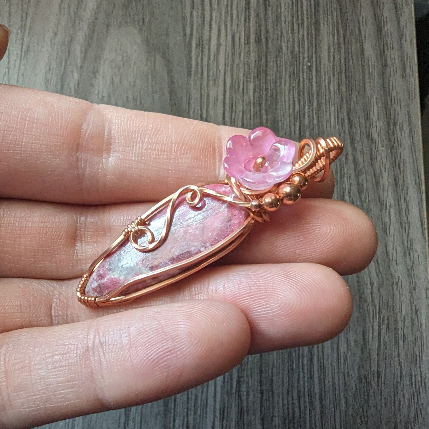 #2 Thulite Flower Pendant - copper wire wrapped