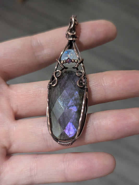 Regal Radiance Pendant - moonstone and purple labradorite copper wire wrapped