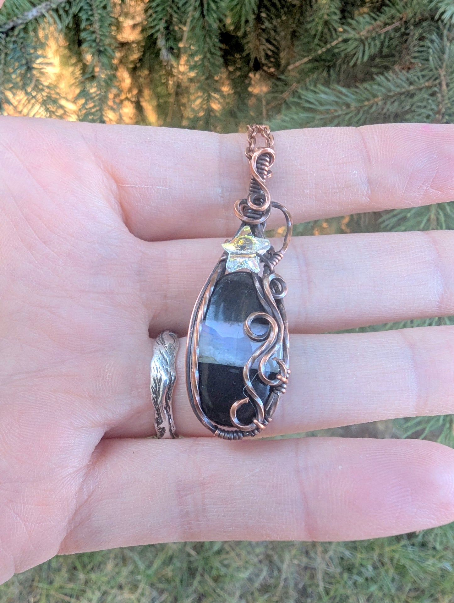 Onyx/moonstone gem pendant - wire wrapped in copper with white star crystal